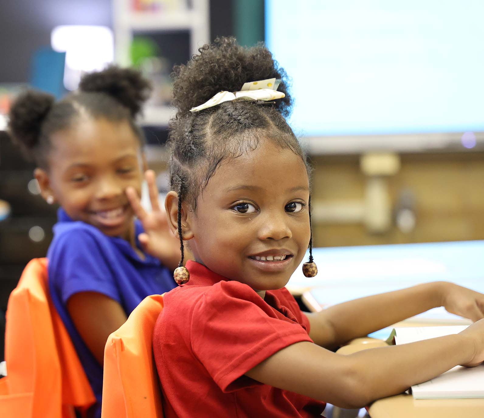 Horizon Science Academy Austintown student wearing headphones uses a laptop in class