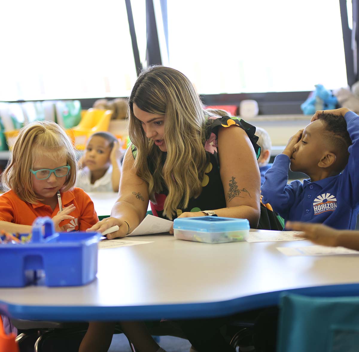 Horizon Science Academy Austintown Teacher and student interacting at a classroom desk