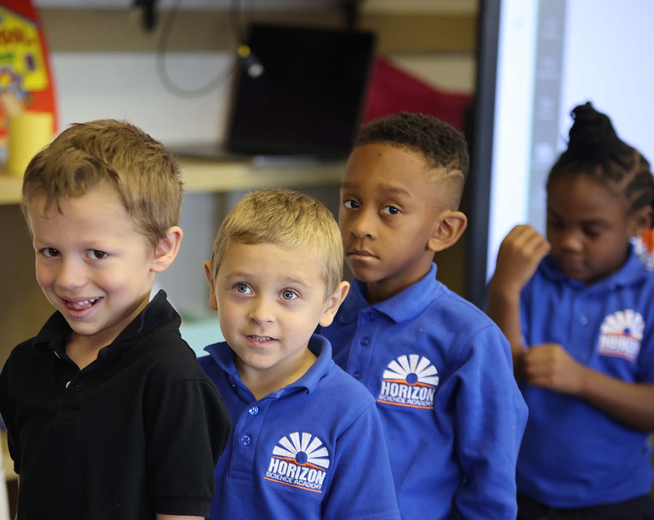 Teacher or school staff member warmly interacting with a student outside